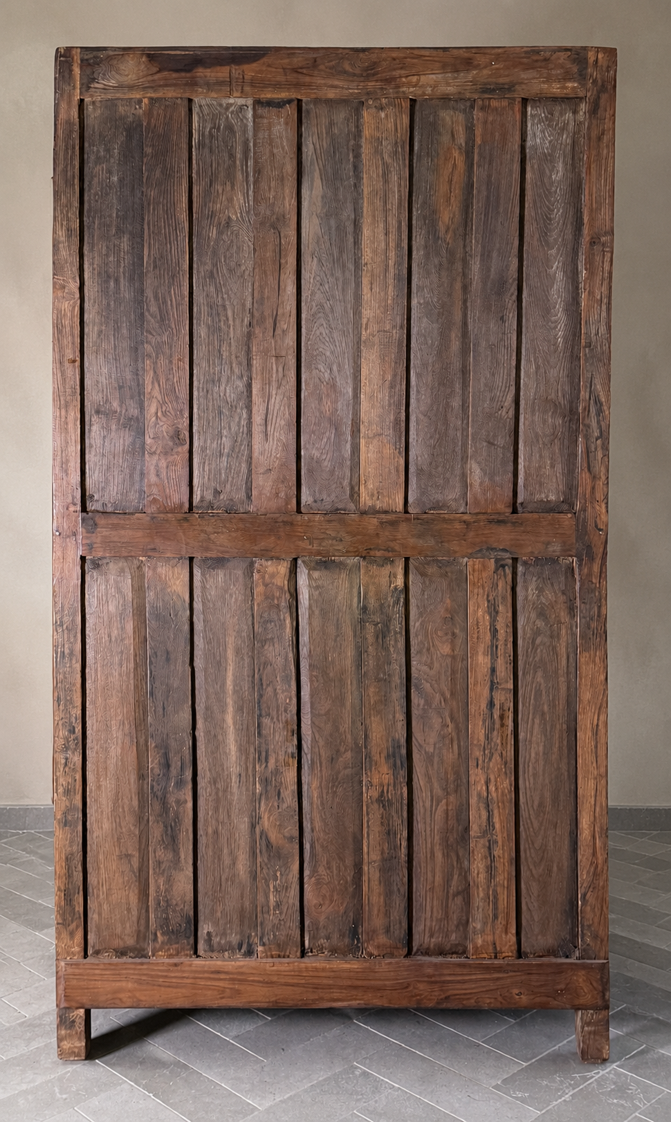 Wooden panel with vertical slats on a neutral background