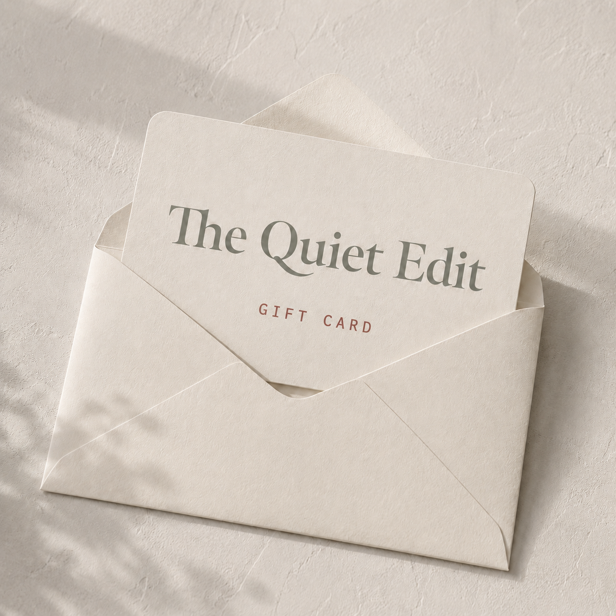 Gift card from 'The Quiet Edit' in an envelope on a light background