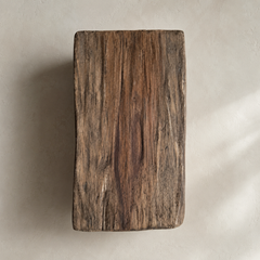 top  view of chair  prominent natural grain patterns, photographed from directly above on a neutral textured beige background. 